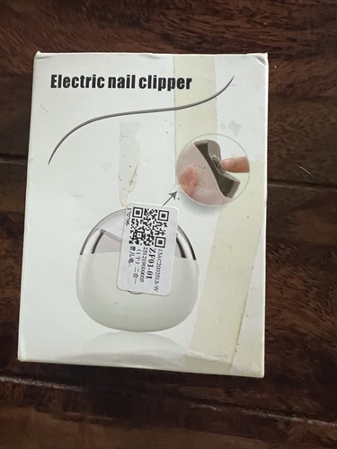 Electric nail clipper - new, in